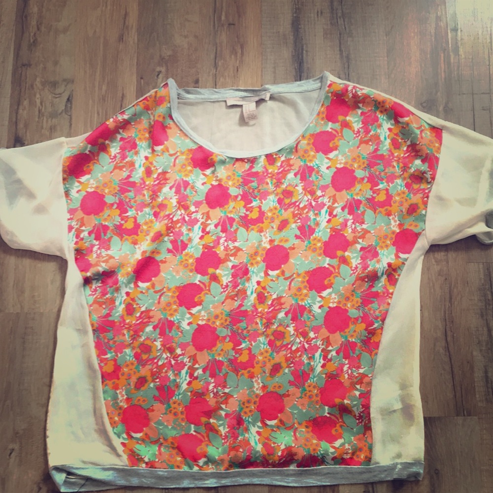Floral top with see though back.